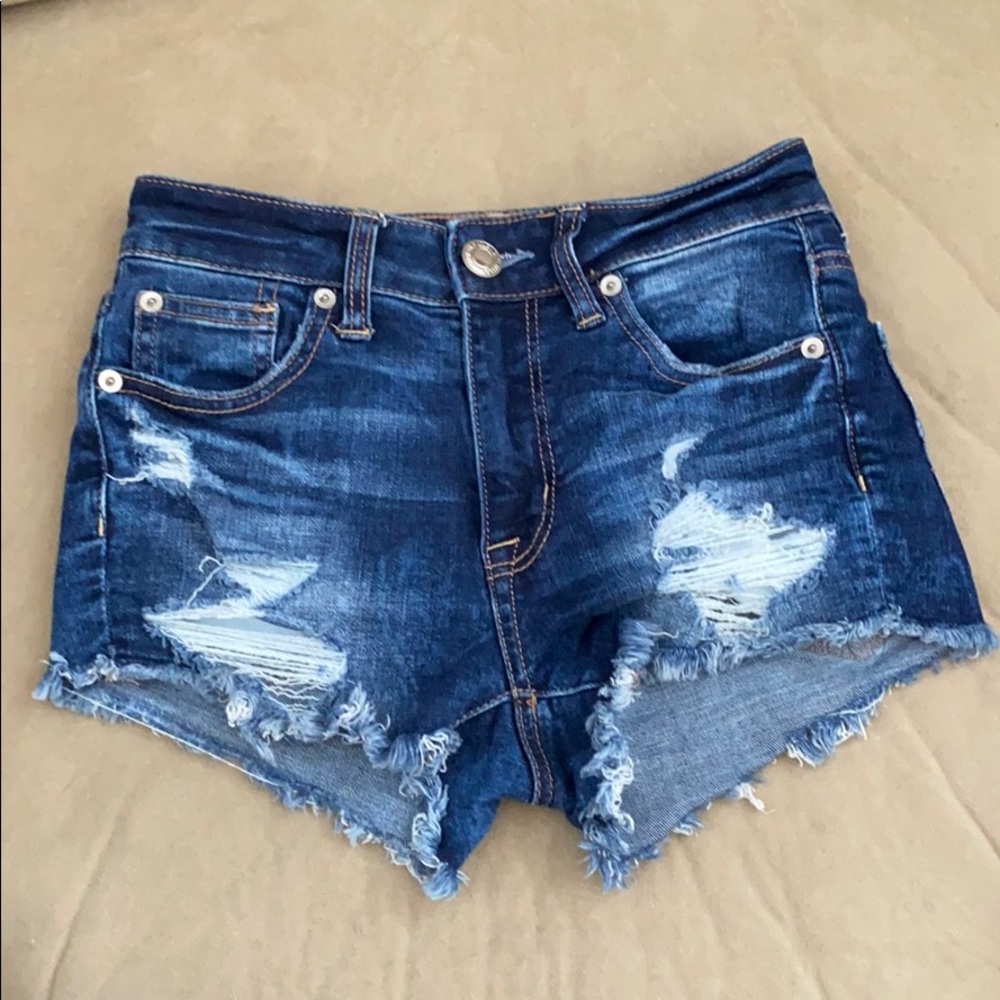 AE super-stretch ripped jean shorts.